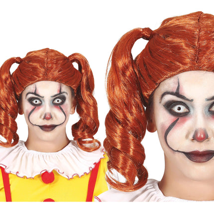 Orange peruk svansar