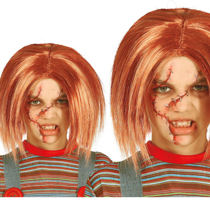 Docka med orange peruk