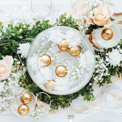 Drijfkaarsen Goud 4cm 50st van Partydeco koop je bij Partywinkel