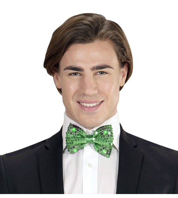 Grön rosett paljetter med ljus