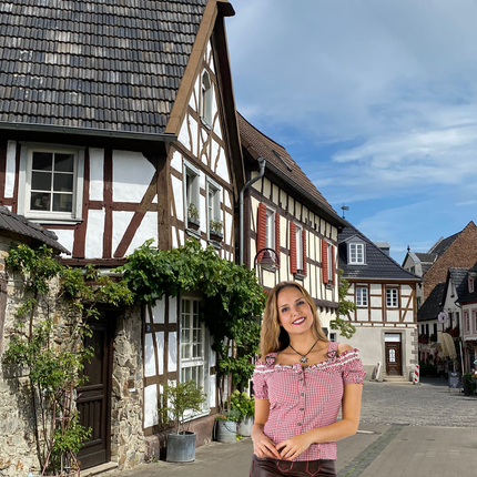 Röd vit blus dam rutig med spännen