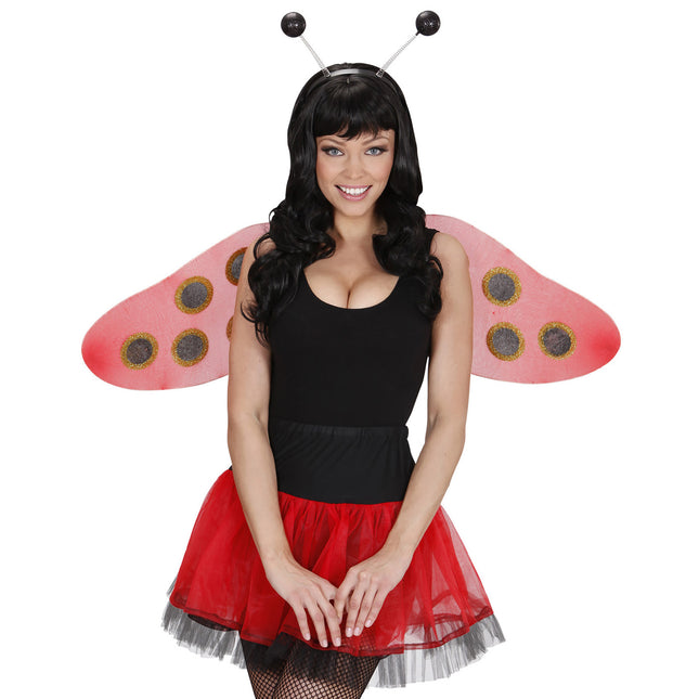 Svart hårbandsantenn med glitter