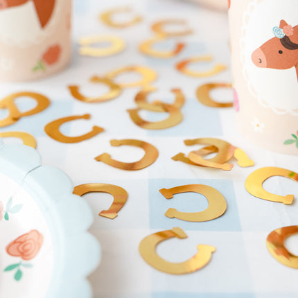 Hästskor med konfetti i guld