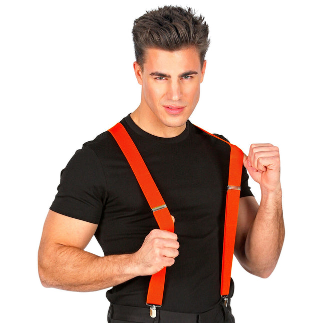 Orange hängslen och livrem