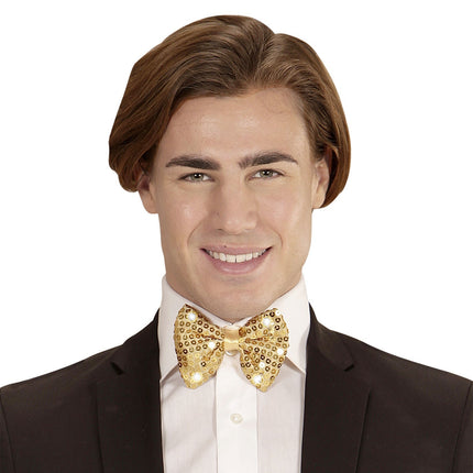 Guldbåge paljetter med ljus