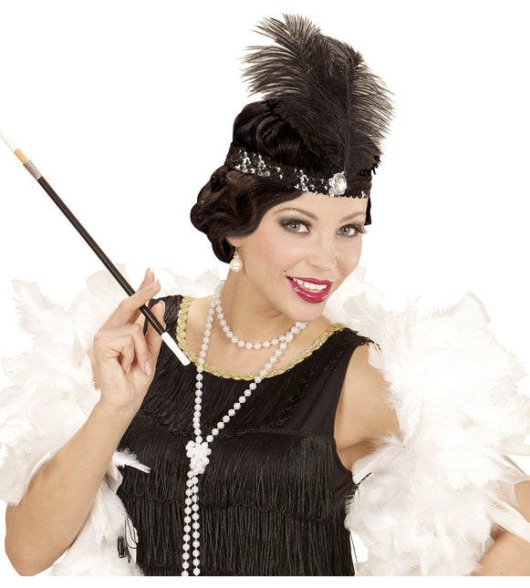 Svart pannband med fjäder