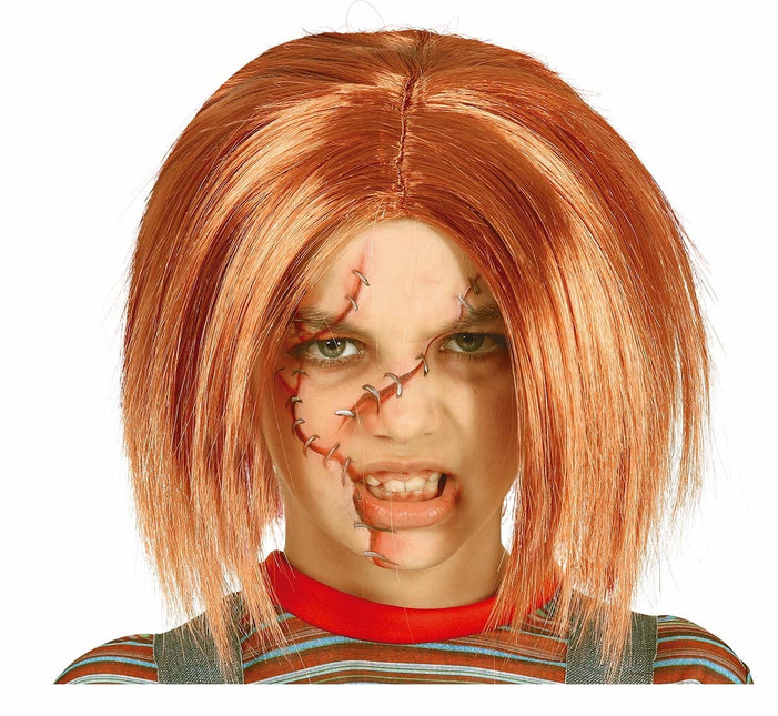 Docka med orange peruk