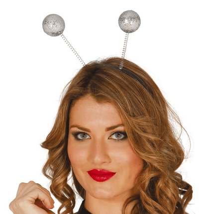 Haarband Bollen Zilveren Glitter van Fiestas Guirca koop je bij Partywinkel