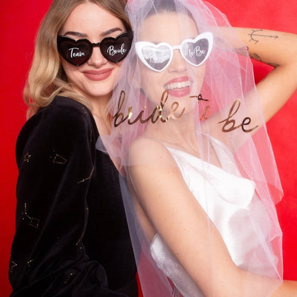 Hartvormige bril met tekst 'Team Bride', zwart van Partydeco koop je bij Partywinkel