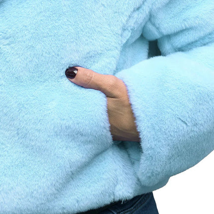 Jasje Fluffy rave lichtblauw (M/L) van Boland koop je bij Partywinkel