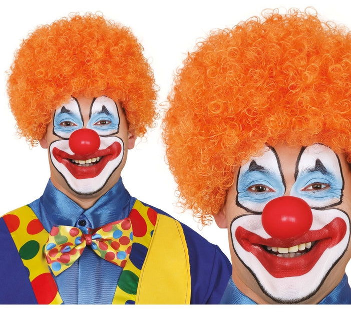 Oranje Pruik Krullen van Fiestas Guirca koop je bij Partywinkel