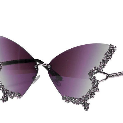 Vlinder Bril Paars van Wilbers & Wilbers koop je bij Partywinkel